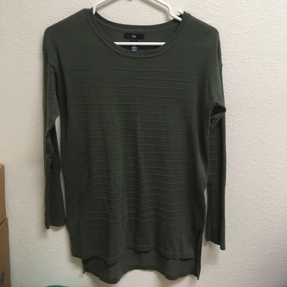 Green sweater.