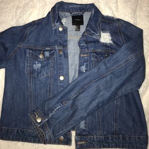 Distressed denim jacket