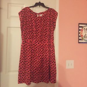 Red-orange dress with navy hearts