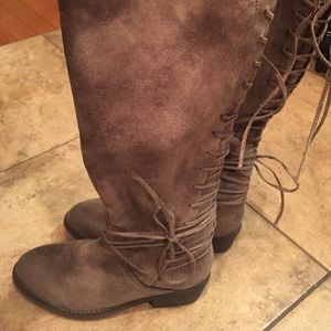 Brown distressed riding boots