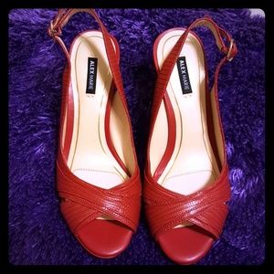 Pair of red leather peep-toe heels