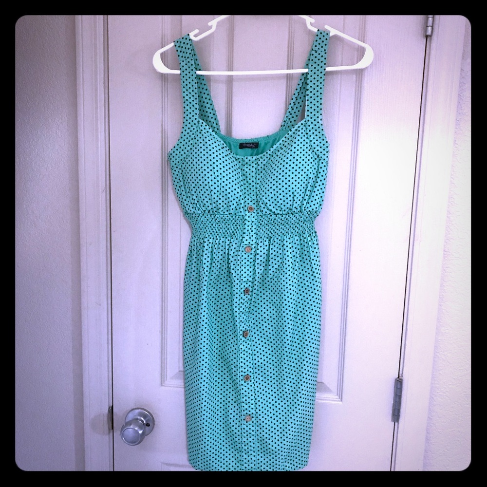 Green short summer dress with black polkadots!