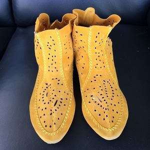 Stylish mustard yellow boho booties