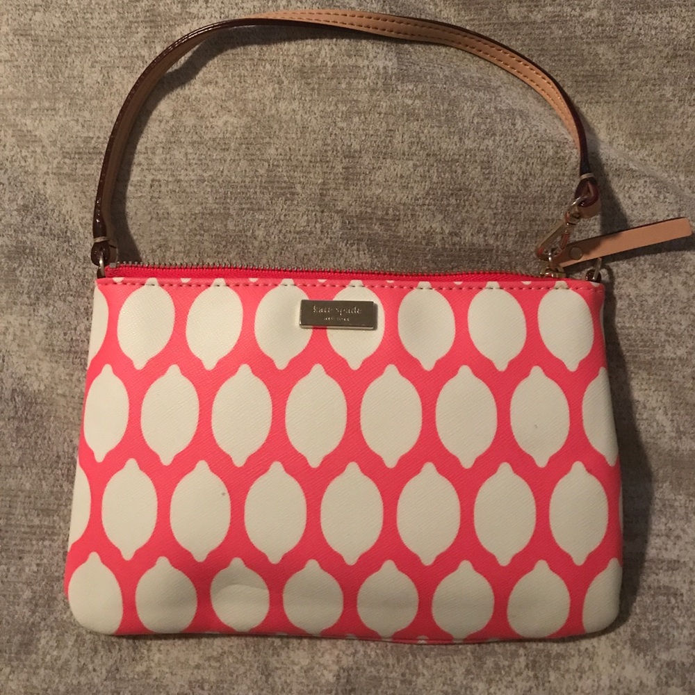 Pink and white Kate Spade clutch