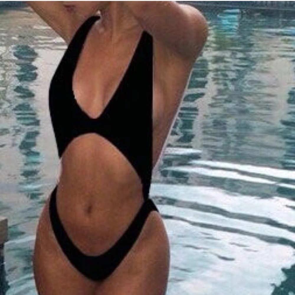 Size small. Black sexy one piece.