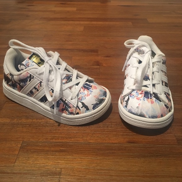 white and peach superstars