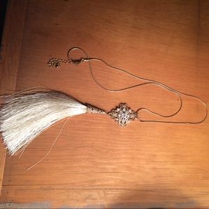 Long statement necklace with tassel