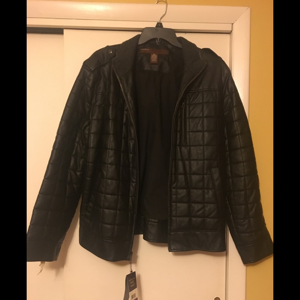 Black quilted style jacket for a man