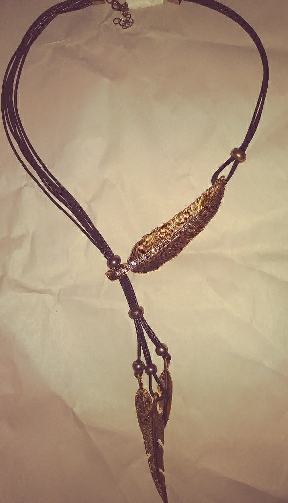Black Straps and Gold Necklace