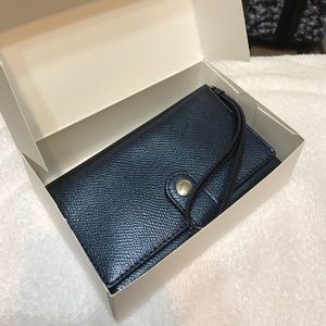 SALE NWT Brand new cute navy blue Coach wristlet.