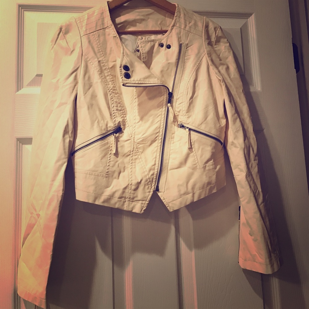 Cream pleather cropped moto jacket.