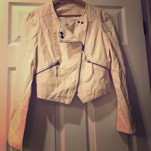 Cream pleather cropped moto jacket.