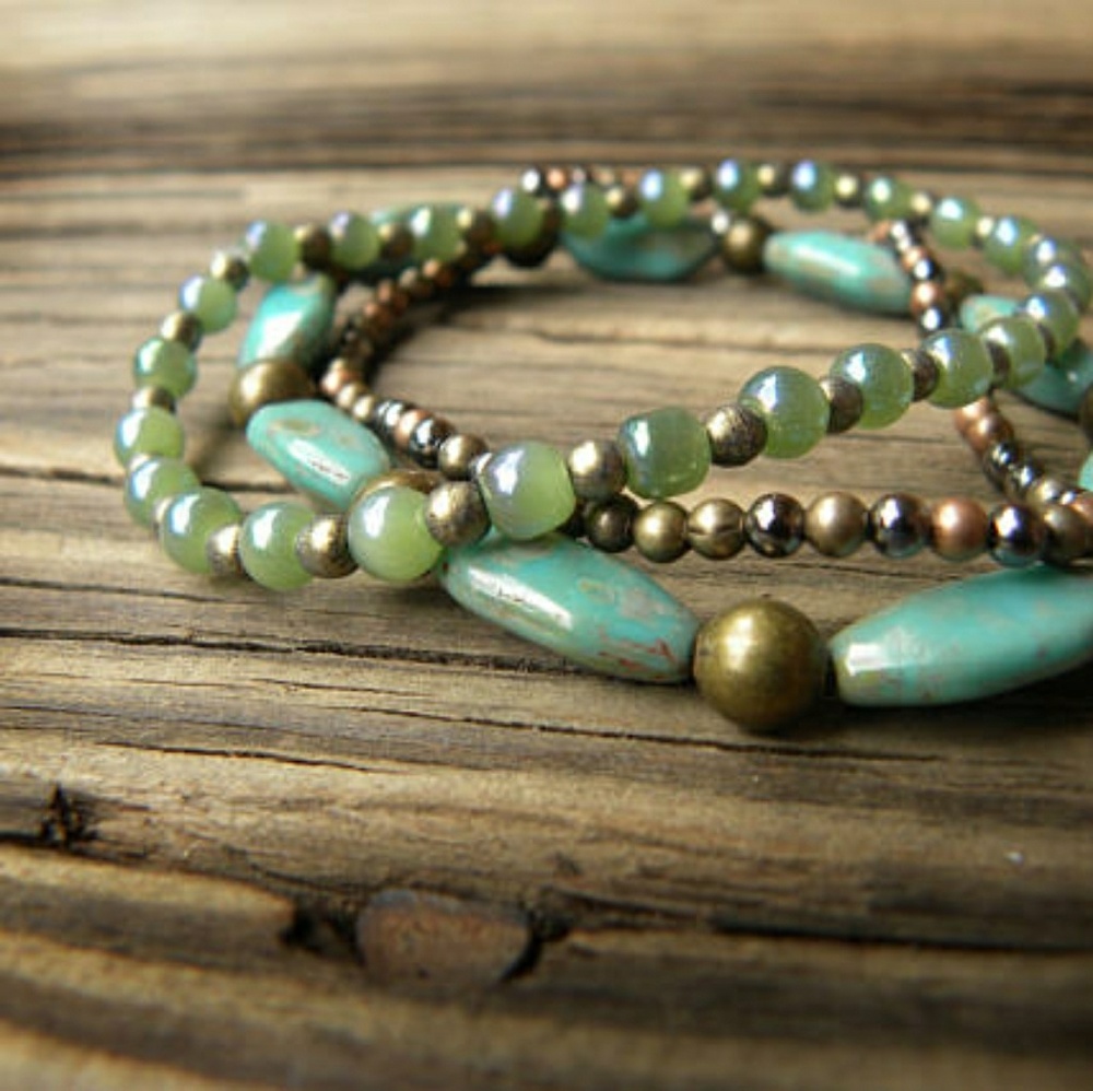Three Elastic Antique Gold and Turqoise Bracelets