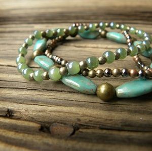Three Elastic Antique Gold and Turqoise Bracelets
