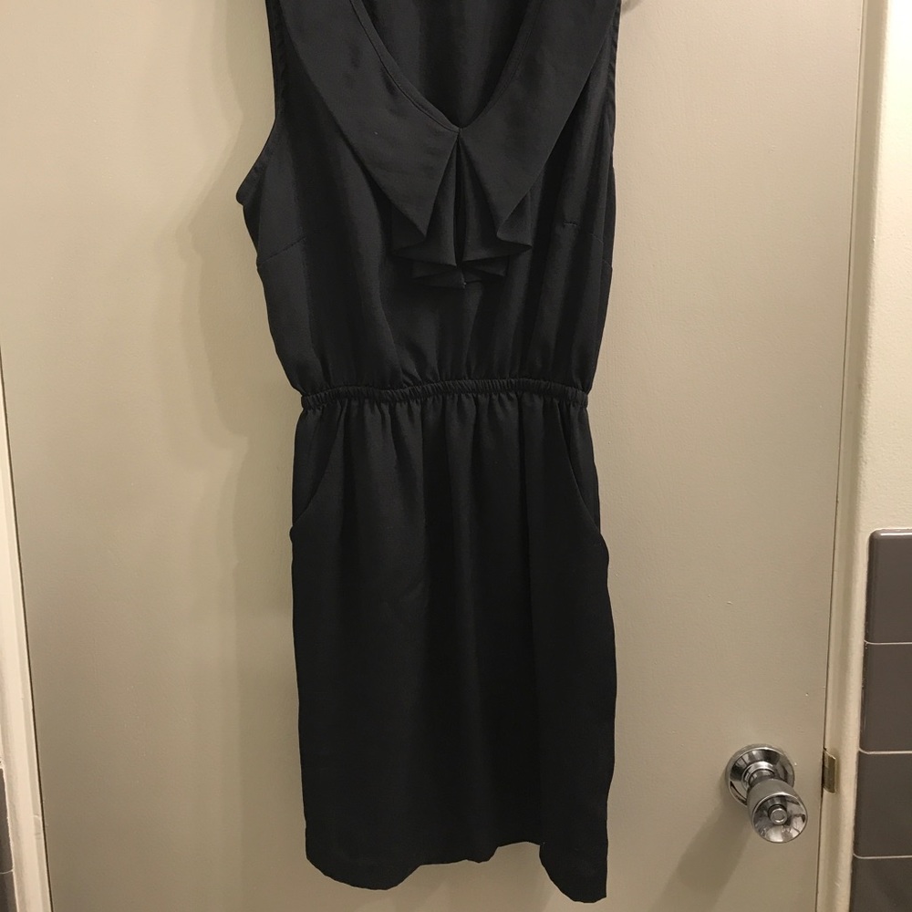 Black dress with fun detail and pockets