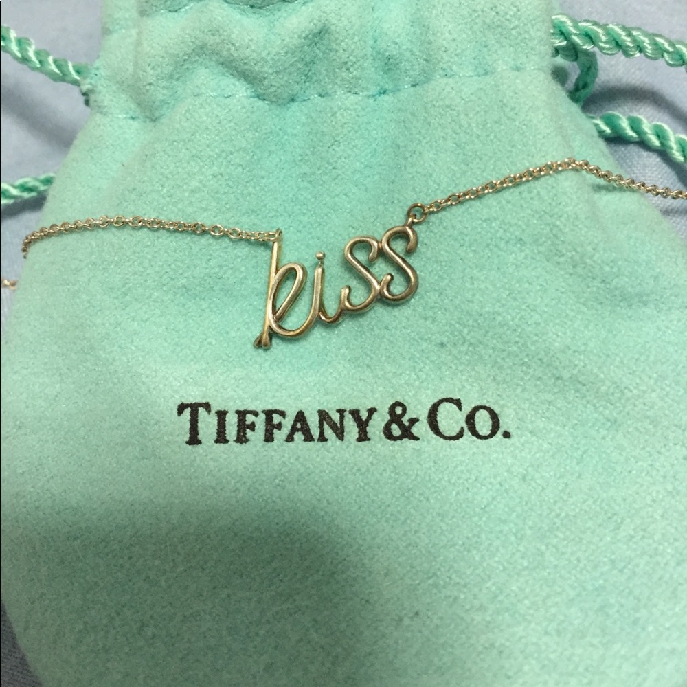 Tiffany & co. Sterling Silver “Kiss” necklace.