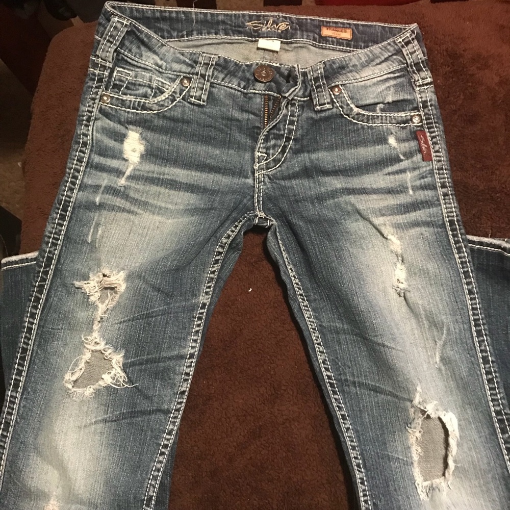 Pre-loved destroyed jeans