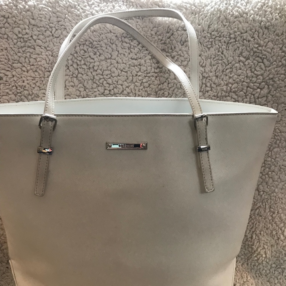 Great white satchel. Goes with any outfit!