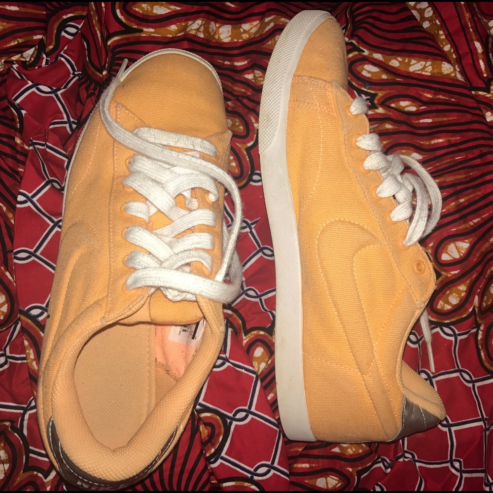 Orange Nike sneakers