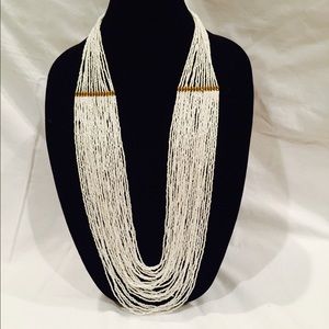 Beautiful long white-beaded necklace