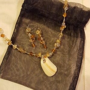 Seashell pendant necklace and matching earrings