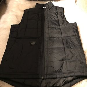 men’s black puffy vest