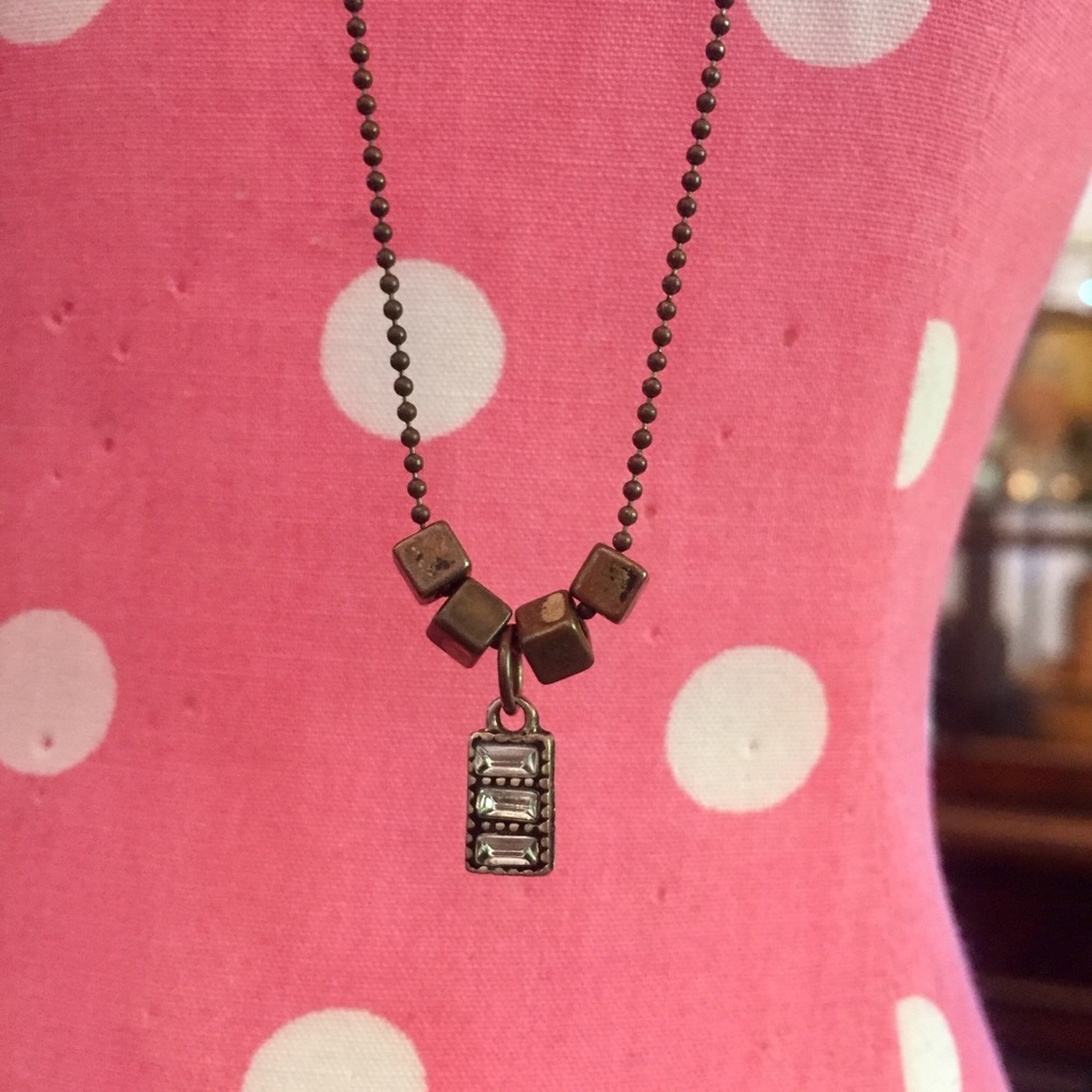 Delicate rustic beads and charm necklace
