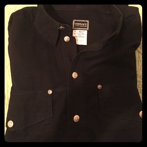 Black long sleeve button up shirt.
