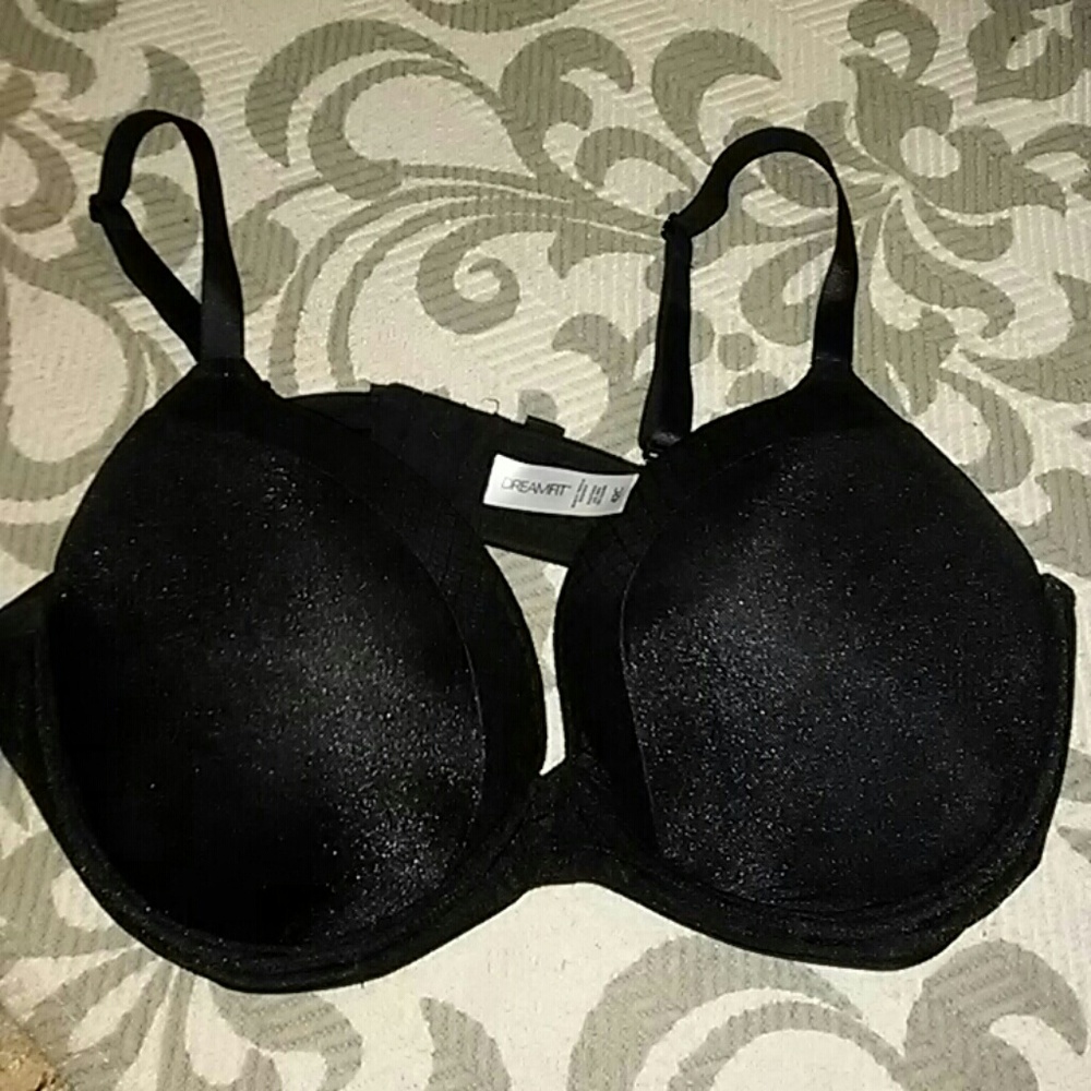Never worn, light push up black bra