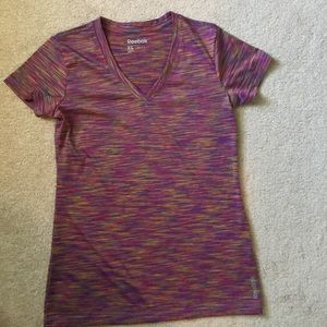 2 Reebok XS play dry work out shirts. Like new.