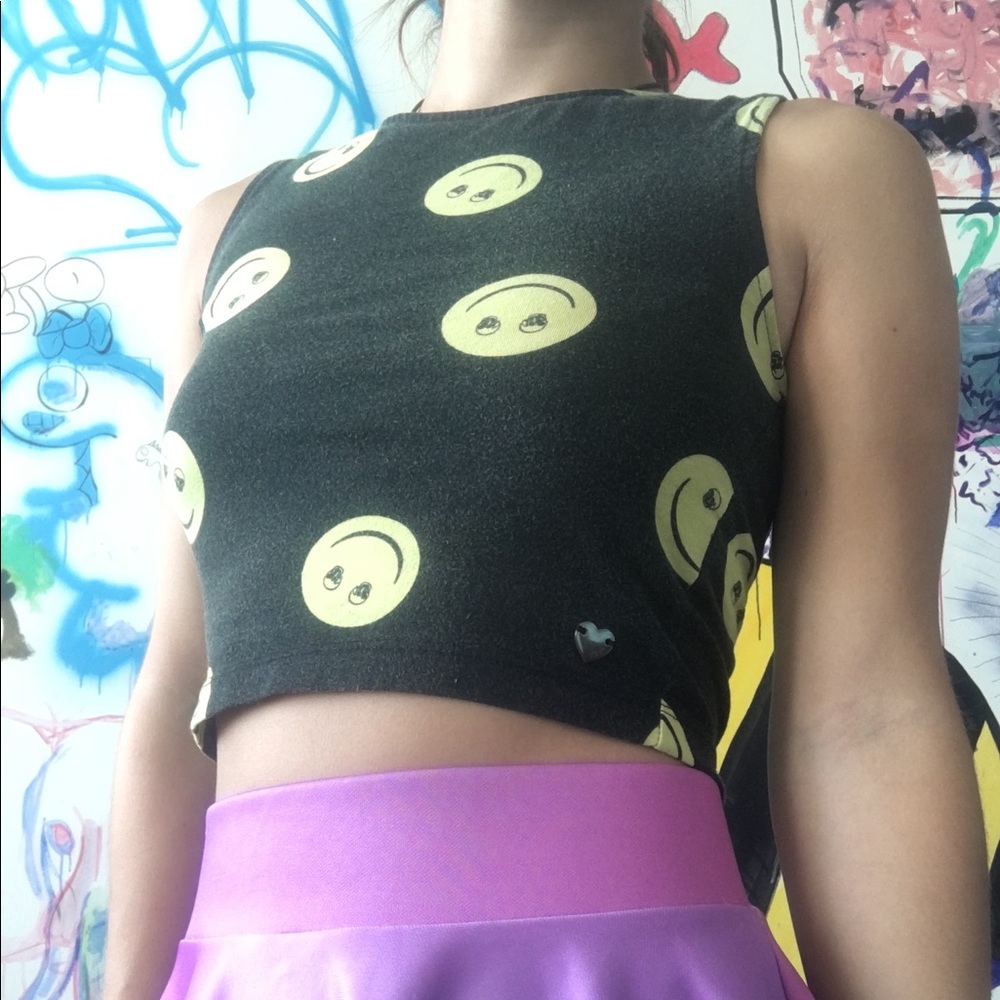 Black cropped tank with skull eyed smiley faces.