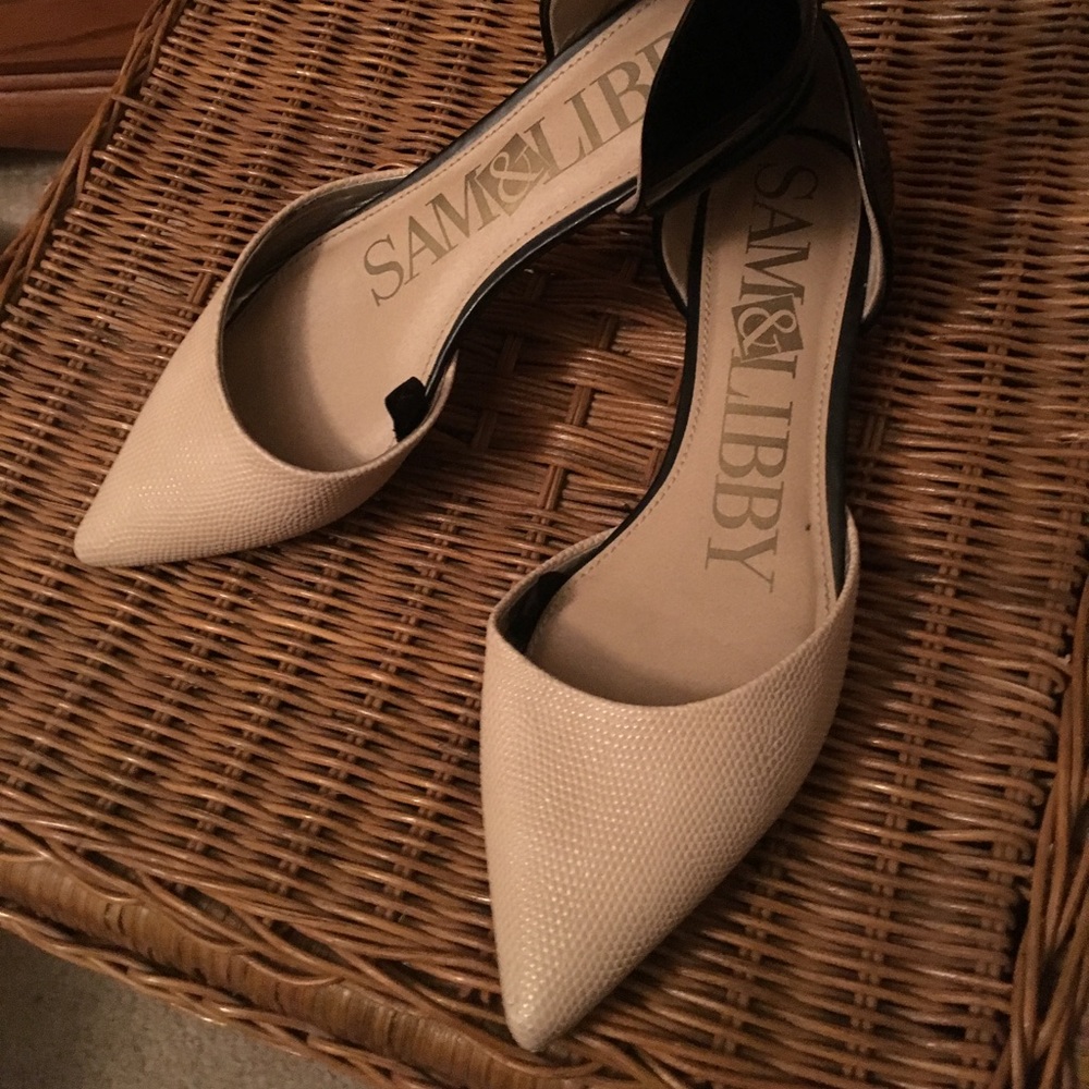 Tan and black flats