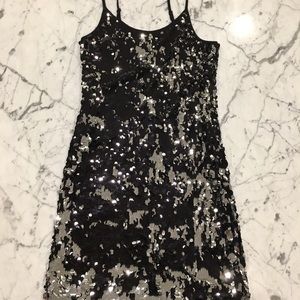 Sexy short black and silver sequence dress.