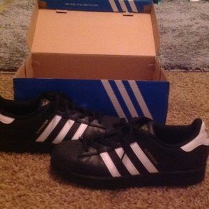 Brand new!! Black adidas superstars