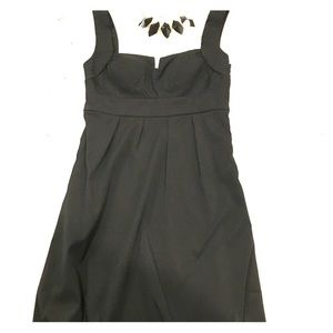 Solid black slightly off the shoulder dress.
