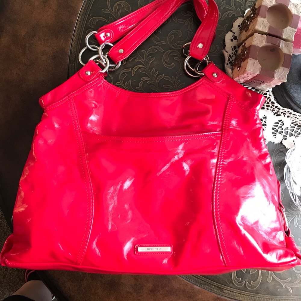 Nine West red vinyl purse. Used condition.”