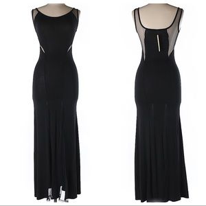 Black bodycon dress with sheer cutouts