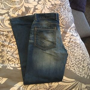 INC Rio low rise boot cut jeans