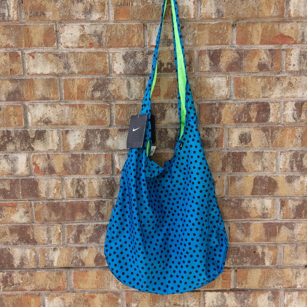 Nike blue and neon yellow reversible bag