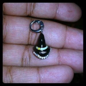 Fossil witch hat charm