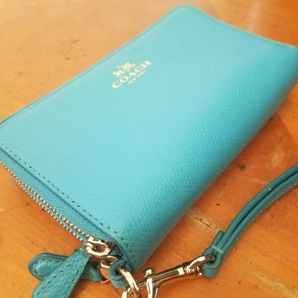 Coach cellphone and wallet wristlet in turquoise