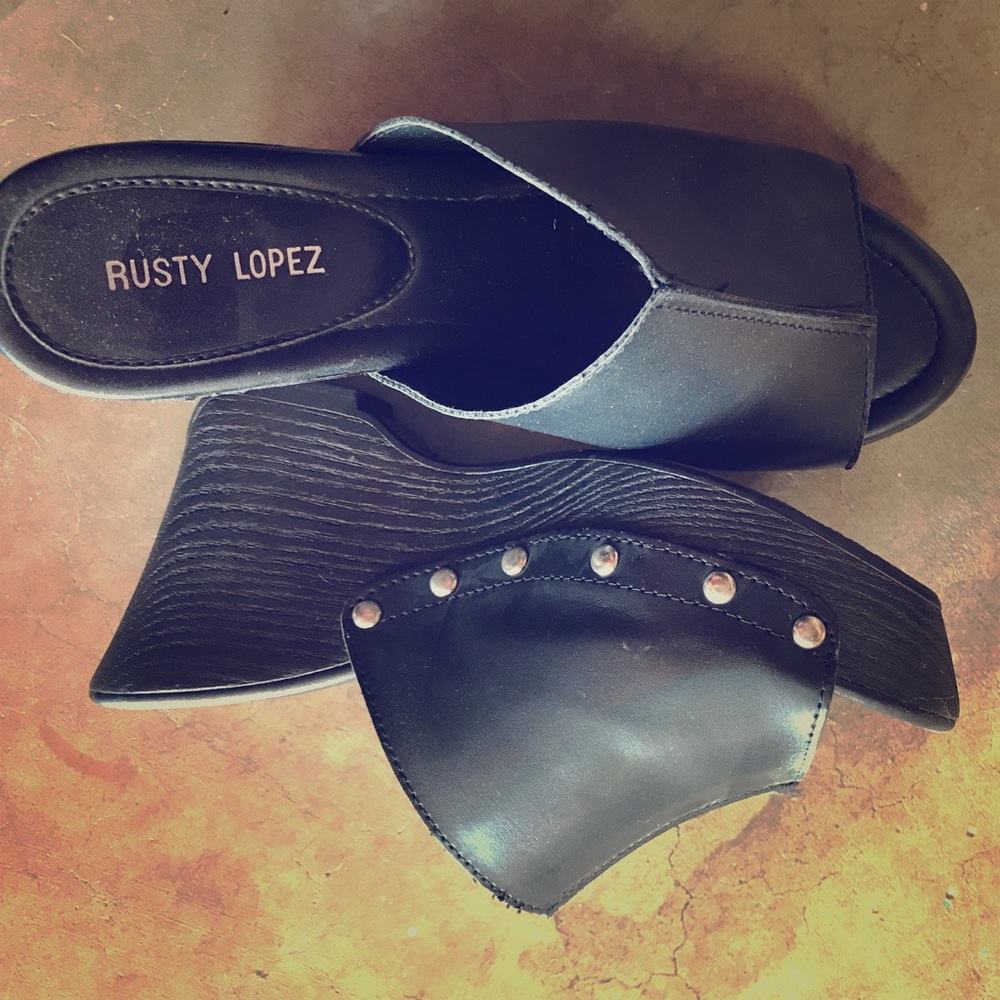 Used rusty lopez clogs