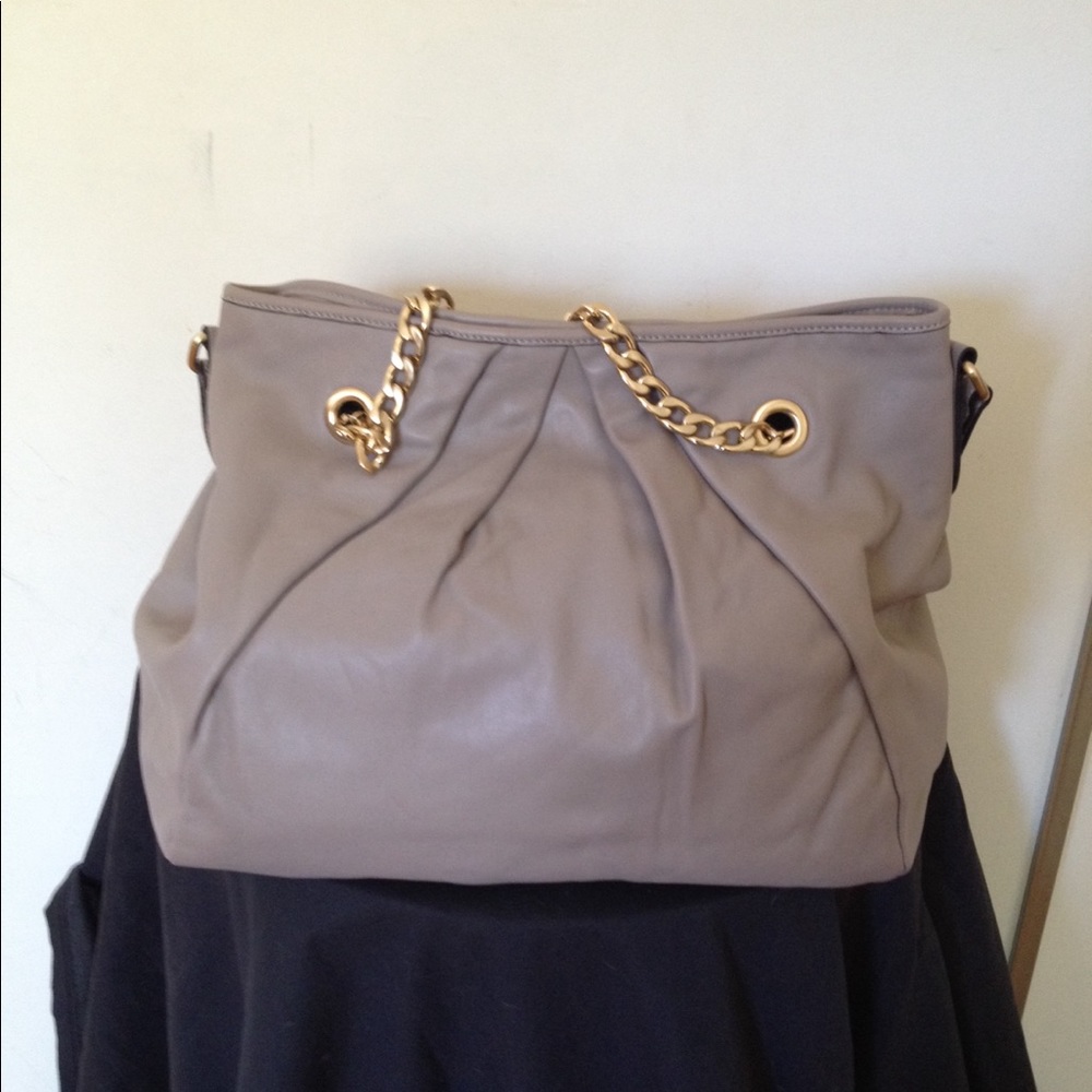 ANN TAYLOR tan handbag.