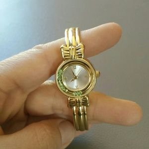 Fashion gold watch with green beads