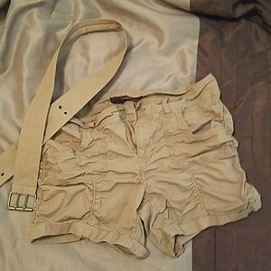 Khaki colored shorts. Comes with belt