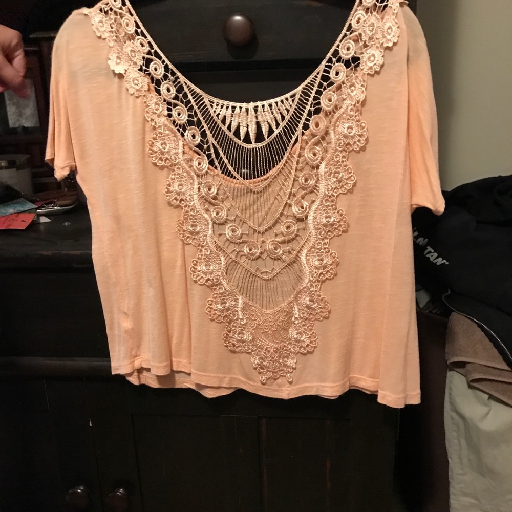 Orange cream colored crop top lace back