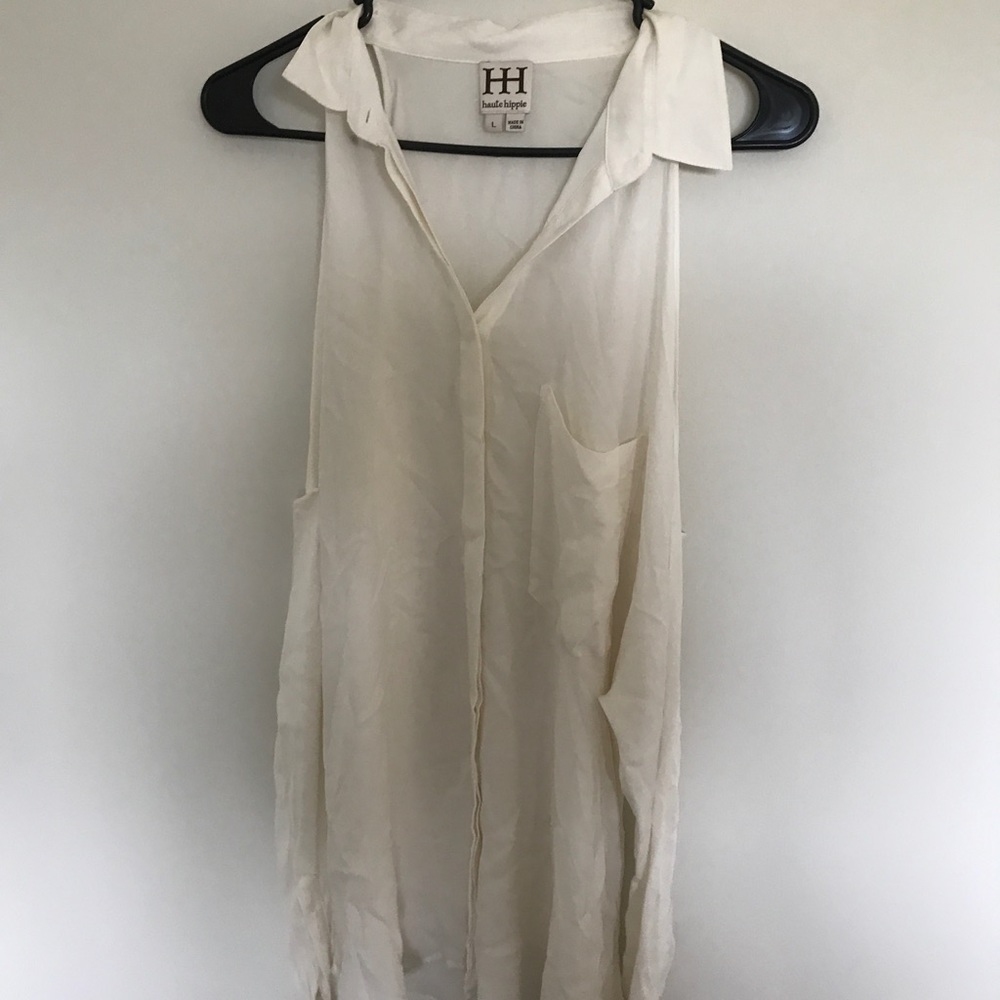 White silk blouse with cut out shoudlers