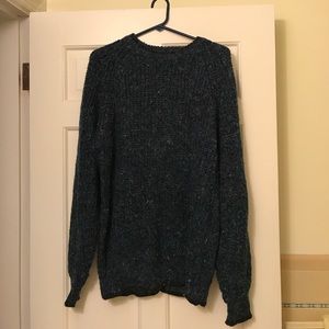 Blue sweater with small colored speckles