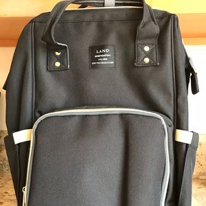 Land Mommy and Baby backpack diaper bag. Brand new