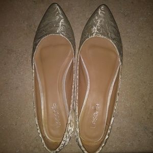 White flowery pattern flats.